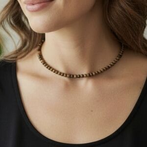 6mm tigers eye necklace; 15" long with a 2" extender: nwot